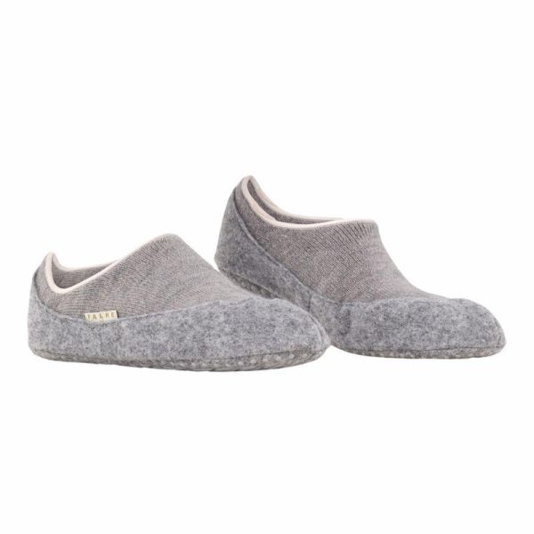 Aikuisten_merinovillaiset_kotitossut_jarrupohjalla